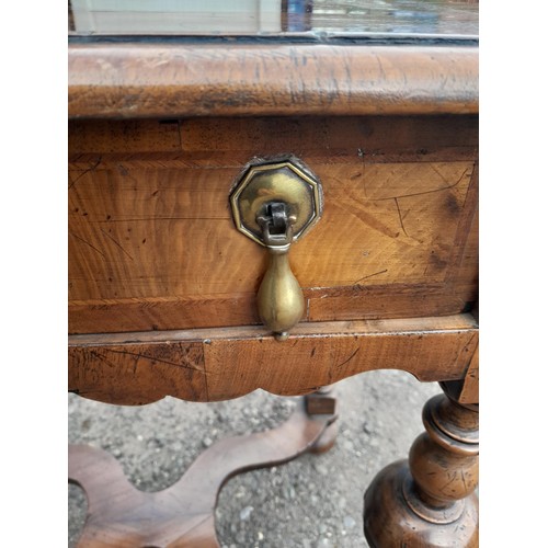 13 - 18th century style walnut  single drawer table with quarter veneer top, carved apron, turned legs wa... 