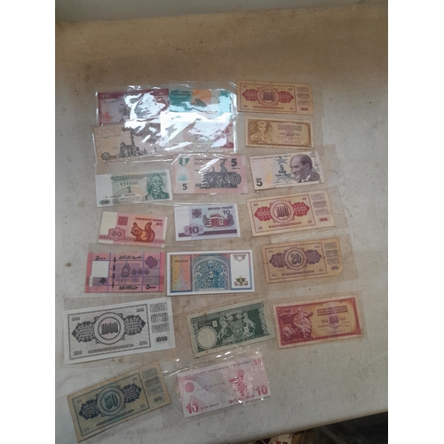 55 - Coins and banknotes : 20 x bank notes from around the world mainly from circ. , some better notes no... 