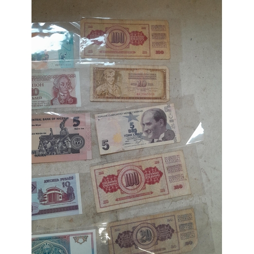 55 - Coins and banknotes : 20 x bank notes from around the world mainly from circ. , some better notes no... 