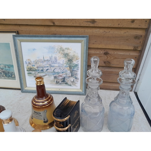 61 - Array of assorted pottery and glass decanters, desk stand, various pictures framed and good roll of ... 