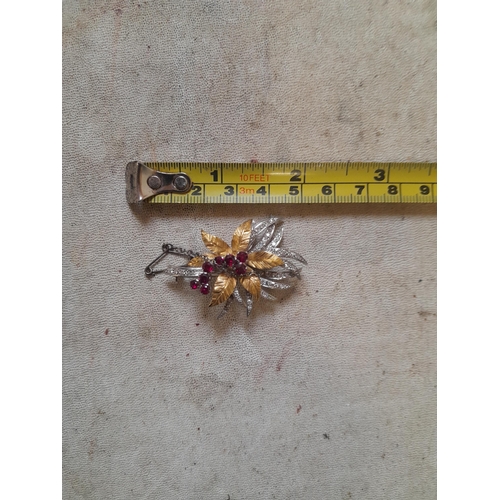 91 - Pretty 18ct gold spray brooch set with diamonds and  rubies 4.8 cms 12 .2 g with some associated pap... 