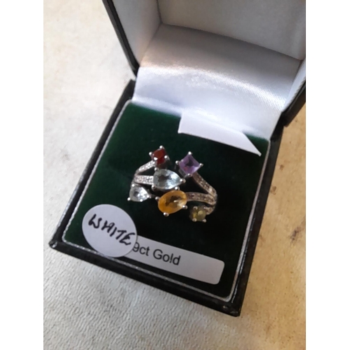 97 - 9 ct gold ring set with coloured stones size P in presentation box