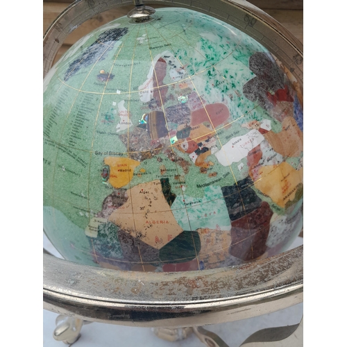 203 - Terrestrial globe set with hardstone