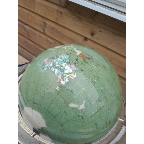 203 - Terrestrial globe set with hardstone