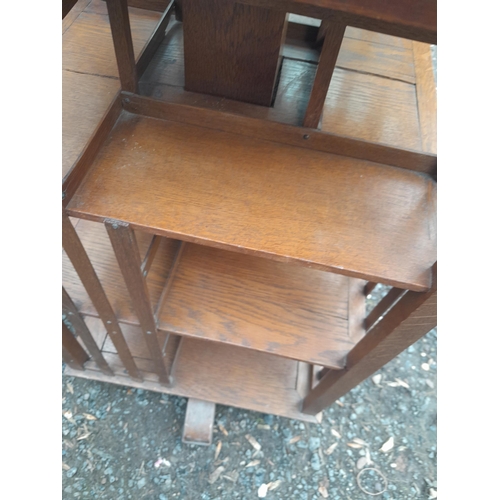 210 - Early 20th century oak revolving bookcase, note splitting