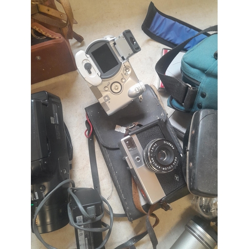 299 - Assorted cameras and accessories, handi cam etc.