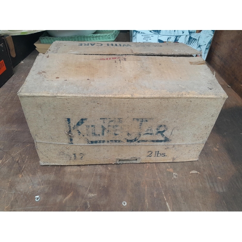 22 - Box partially filled with Kilner jars