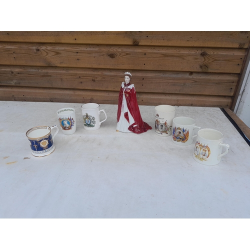 57 - Assorted commemorative ware including Royal Worcester QEII figure and mugs