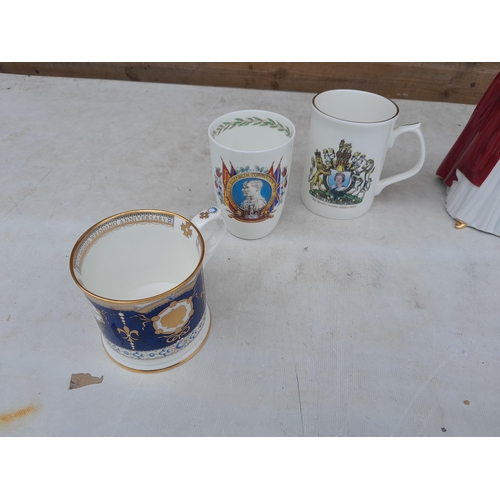 57 - Assorted commemorative ware including Royal Worcester QEII figure and mugs