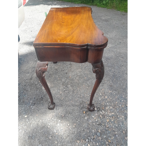 65 - Early 20th century mahogany folding and carved card table with flip top, cabriole legs 92 cms x  51 ... 