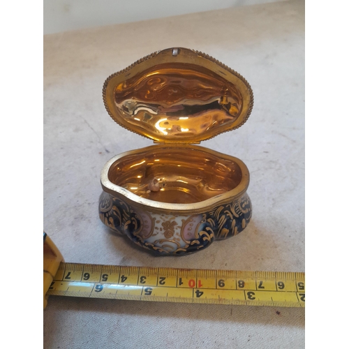 87 - Early 20th century Continental porcelain trinket box with gilded metal interior