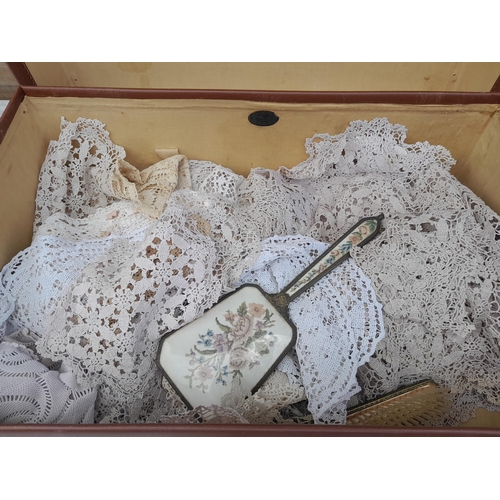 112 - Vintage Revelation suitcase with some crochet work table settings & dressing table mirror