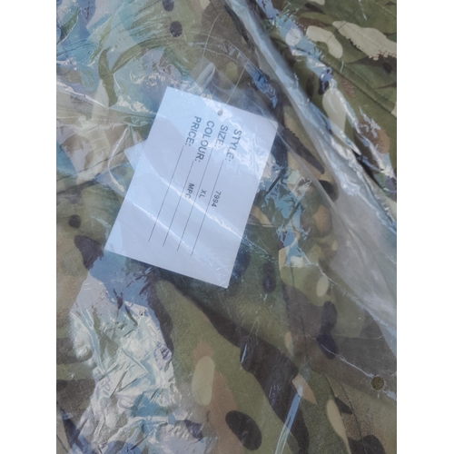 126 - Mainly New Old Stock : Army surplus fatigues, jackets, combats, pouches etc.