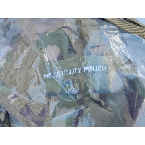 126 - Mainly New Old Stock : Army surplus fatigues, jackets, combats, pouches etc.