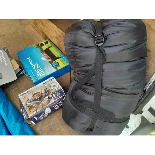 127 - Mainly New Old Stock : sleeping bag, camping related items, mobile mains kit etc.