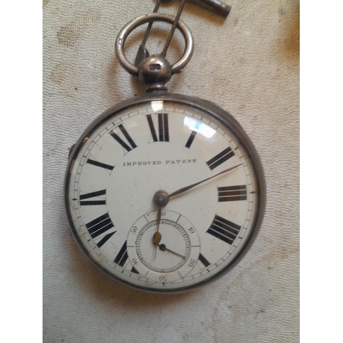 129 - 19th century silver pocket watch with key and one other