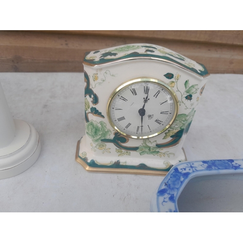 184 - Box of china : double sided clock, Masons mantle clock , ebony brush set with silver mounts