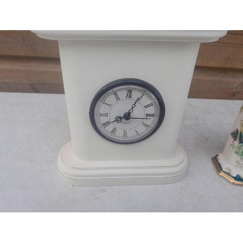 184 - Box of china : double sided clock, Masons mantle clock , ebony brush set with silver mounts