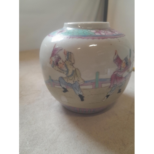 186 - 2 x Famille Rose Chinese pottery ginger jars decorated with playing children, note lid restored