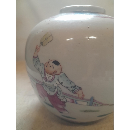 186 - 2 x Famille Rose Chinese pottery ginger jars decorated with playing children, note lid restored