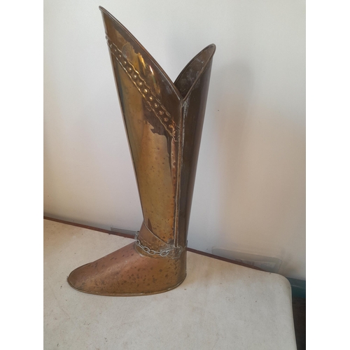 223 - Early 20th century brass stick stand modelled as a piece of antique armour 148 cms high