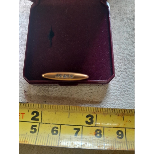 369 - 9 ct gold bar brooch with gold plated pin set with small diamonds 0.7 g in a H Samuel box