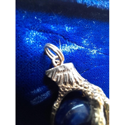 373 - Interesting hallmarked 9 ct gold and lapis ball and claw charm in a Richard Ogden presentation box o... 