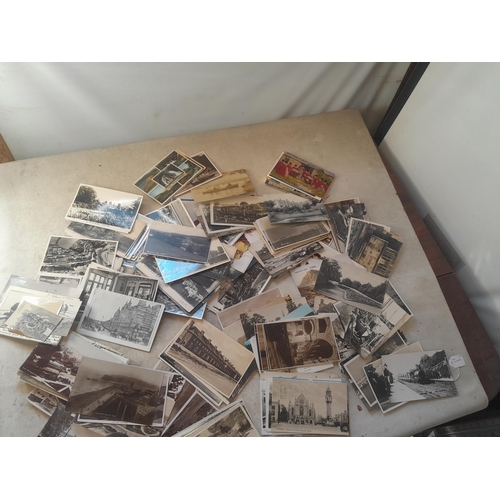 14 - Tupperware box of postcards, mainly black and white from the early to mid 20th century , mainly UK t... 