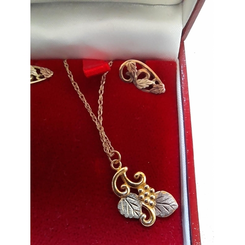 54 - 9 KT gold pendant chain and earring set 3.3 g