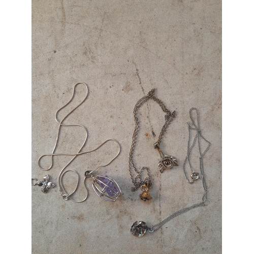 67 - Small collection of silver jewellery : necklaces, pendants etc.