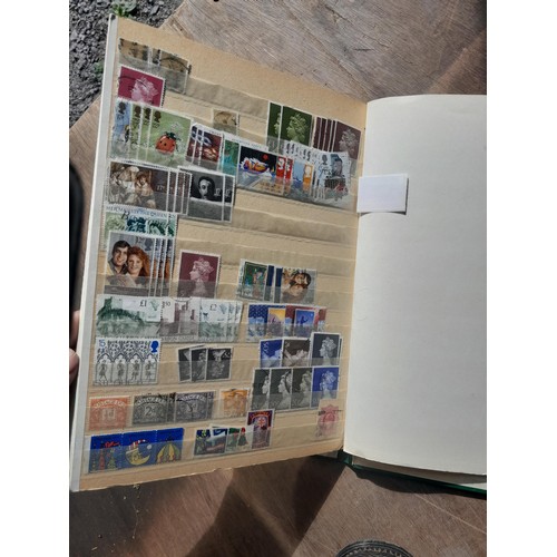 181 - Stamps : a few earlier but nearly all QEII stamps in 2 x albums & 3 x stockbooks, mainly used some m... 