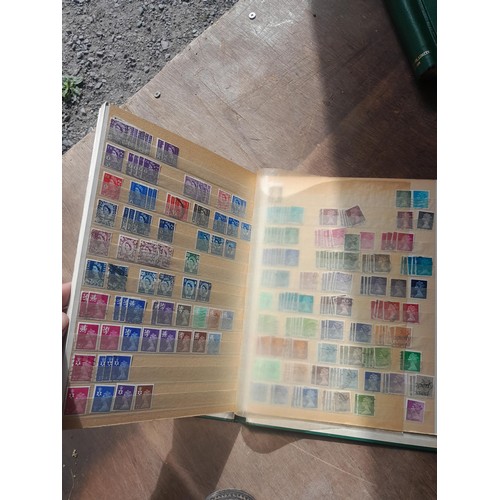 181 - Stamps : a few earlier but nearly all QEII stamps in 2 x albums & 3 x stockbooks, mainly used some m... 