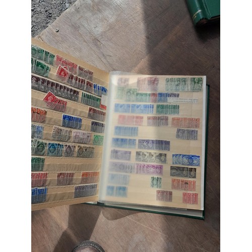 181 - Stamps : a few earlier but nearly all QEII stamps in 2 x albums & 3 x stockbooks, mainly used some m... 