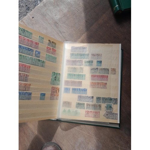 181 - Stamps : a few earlier but nearly all QEII stamps in 2 x albums & 3 x stockbooks, mainly used some m... 