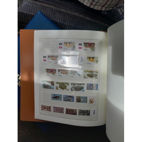 183 - Stamps : plastic storage box containing 7 x large albums Ka-Be , Lindner, odd collections but useful... 