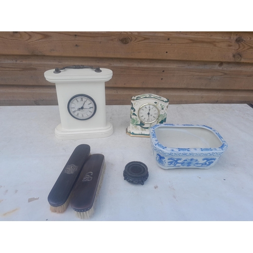 283 - Box of china : double sided clock, Masons mantle clock , ebony brush set with silver mounts