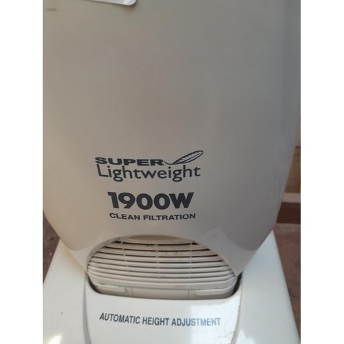 9 - Panasonic 1900 W Super Light weight upright hoover with instructions