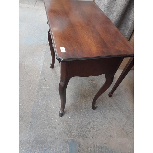 53 - Vintage mahogany side table on wavy legs with single drawers 74 cms x  44 cms x 77 cms