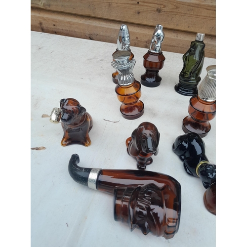 4 - Collection of Avon bottles  : dogs, chess pieces etc.