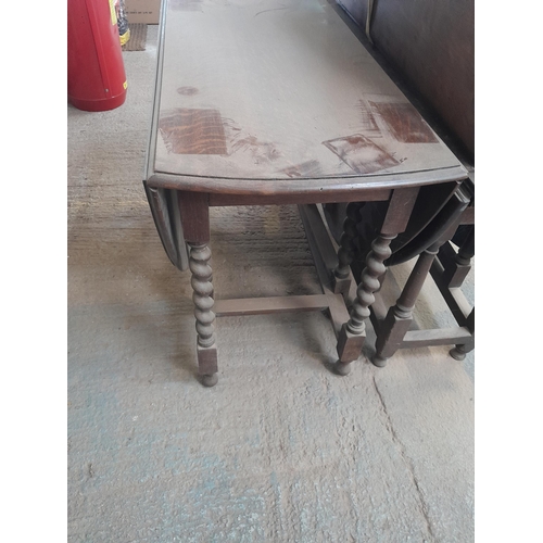 96 - Vintage oak barley twist gateleg table 107 cms x 152 cms x 73 cms