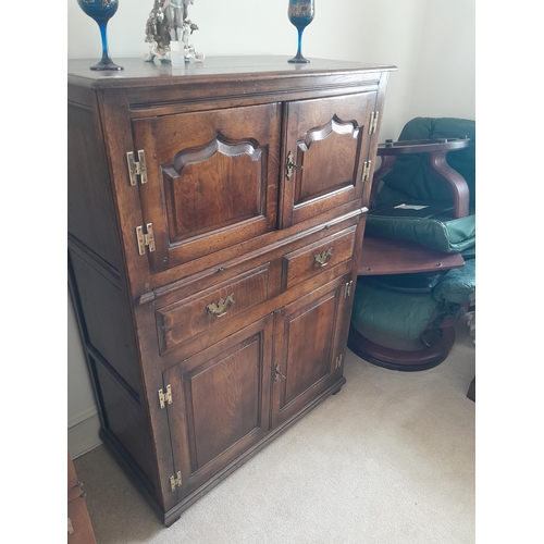 48 - 20th century antique style oak cupboard with two drawers