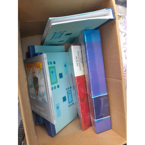 11 - Box of painting related books with some sketch pads , Flower Fairy painting book etc.