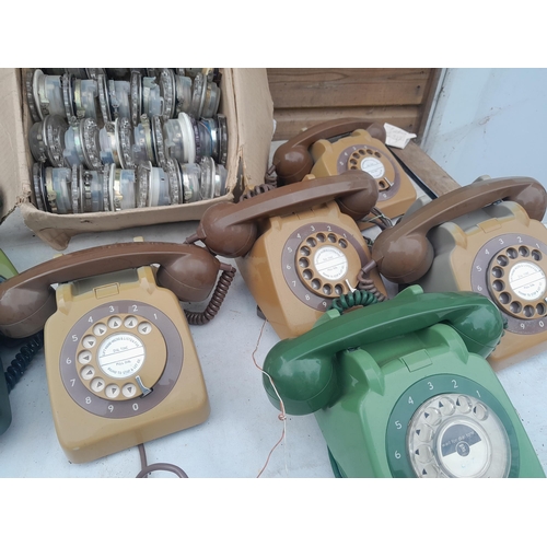 58 - Collection of various vintage plastic telephones, some for spares, box of diallers, hand sets etc.