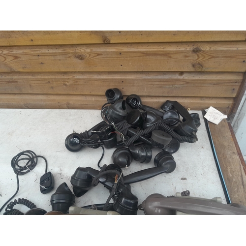 60 - Various plastic telephones, some hand sets for spares