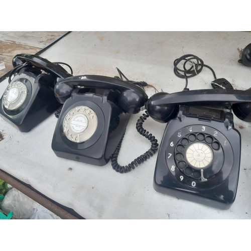 60 - Various plastic telephones, some hand sets for spares