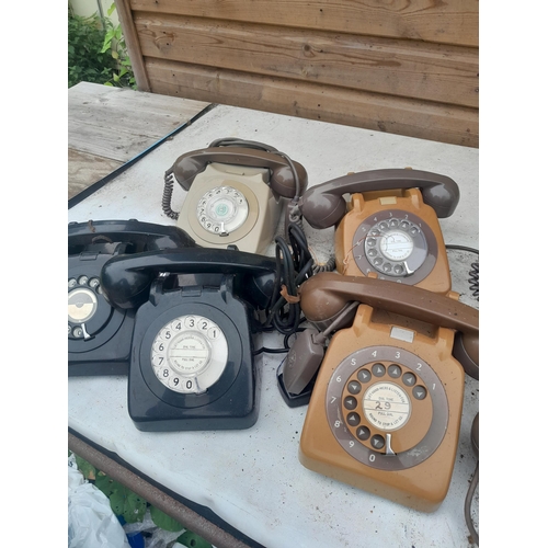 65 - Collection of vintage plastic telephones & a box of diallers for spares