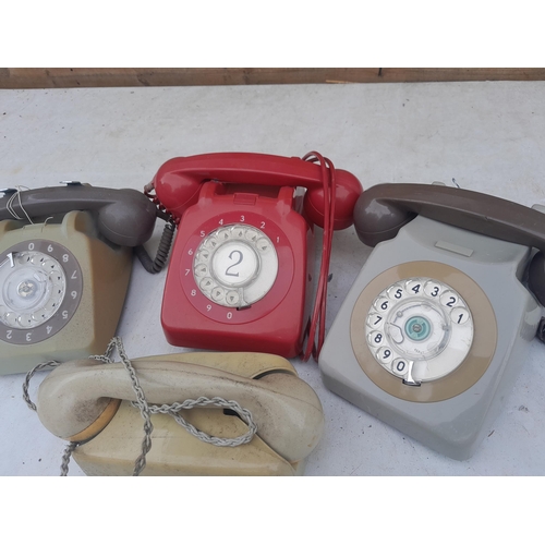 67 - Various vintage plastic telephones