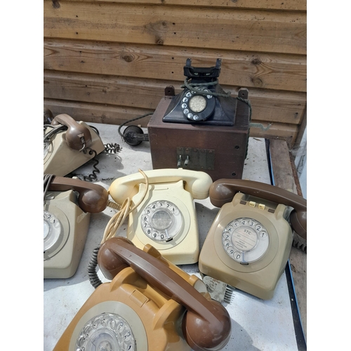 154 - Collection of mixed era telephones, bakelite and plastic