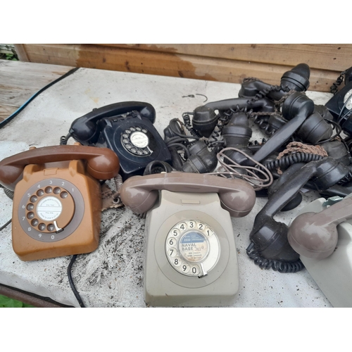 157 - 8 x plastic telephones and box of handsets