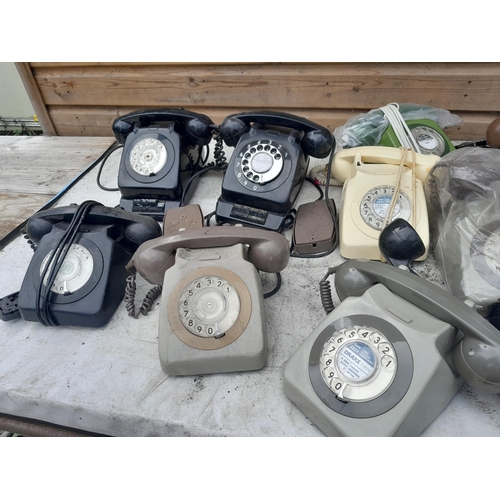 172 - Mixed era plastic telephones